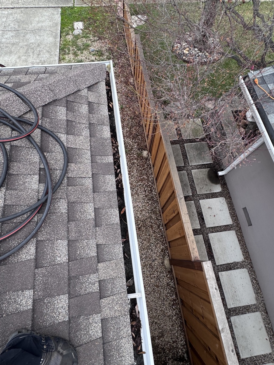 Gutters packed with leaves before cleaning — Milpitas CA job